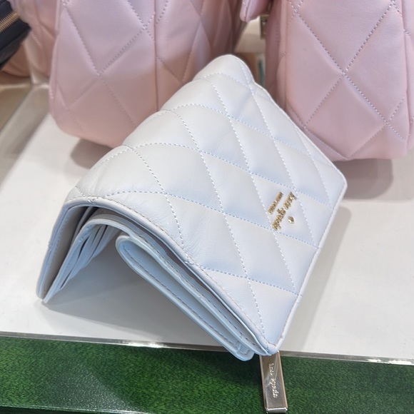 Kate Spade Carey Medium Compartment Bifold Wallet 
COLOR: Parchment - Picture 16 of 16